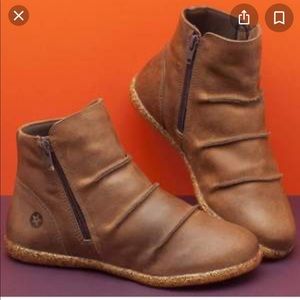 Brown flat bootie with fold detail and zip